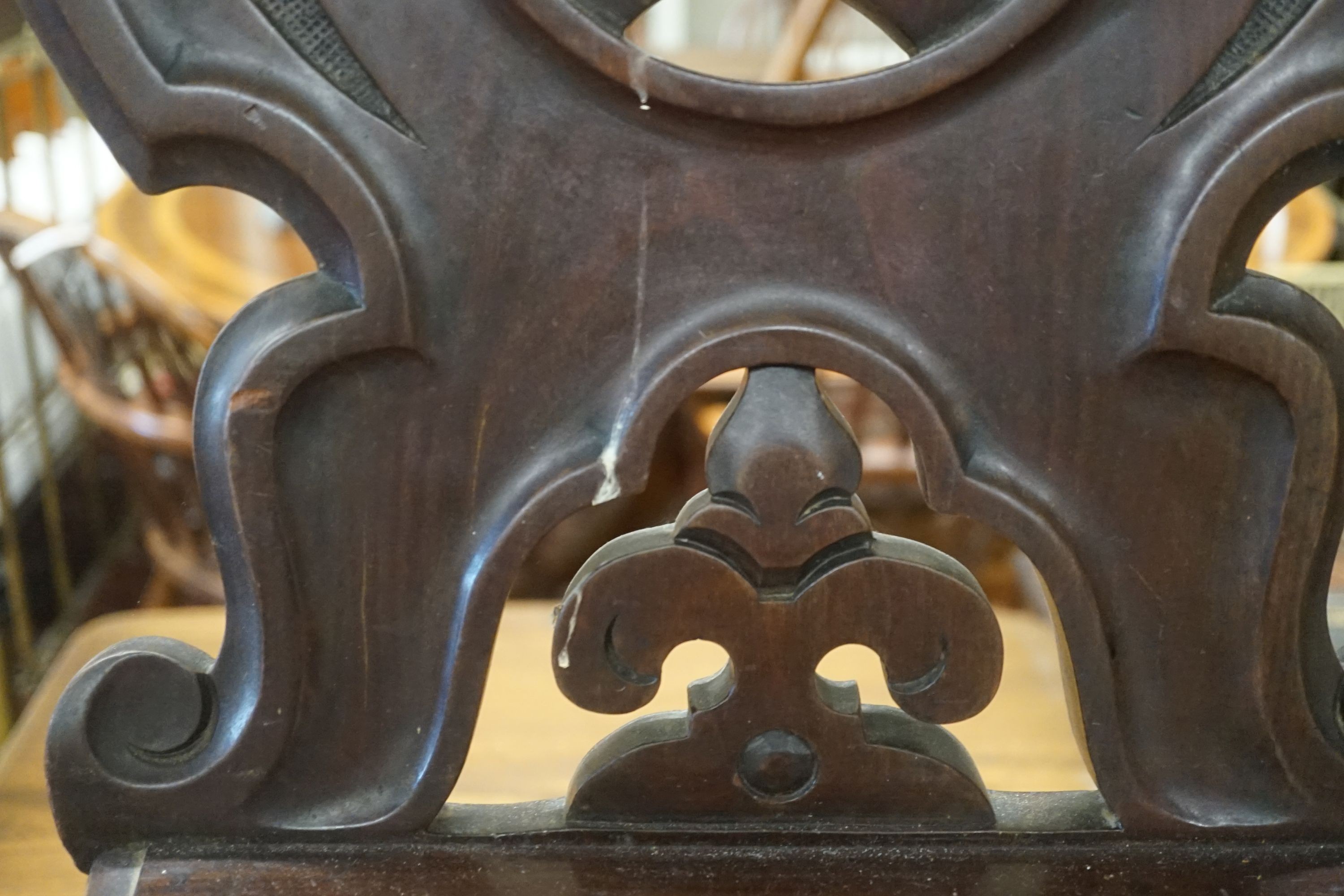 A pair of Victorian mahogany hall chairs